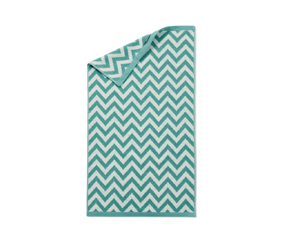 Ein aqua-farbenes Jacquard-Handtuch mit Zickzackmuster, 2 Stück.