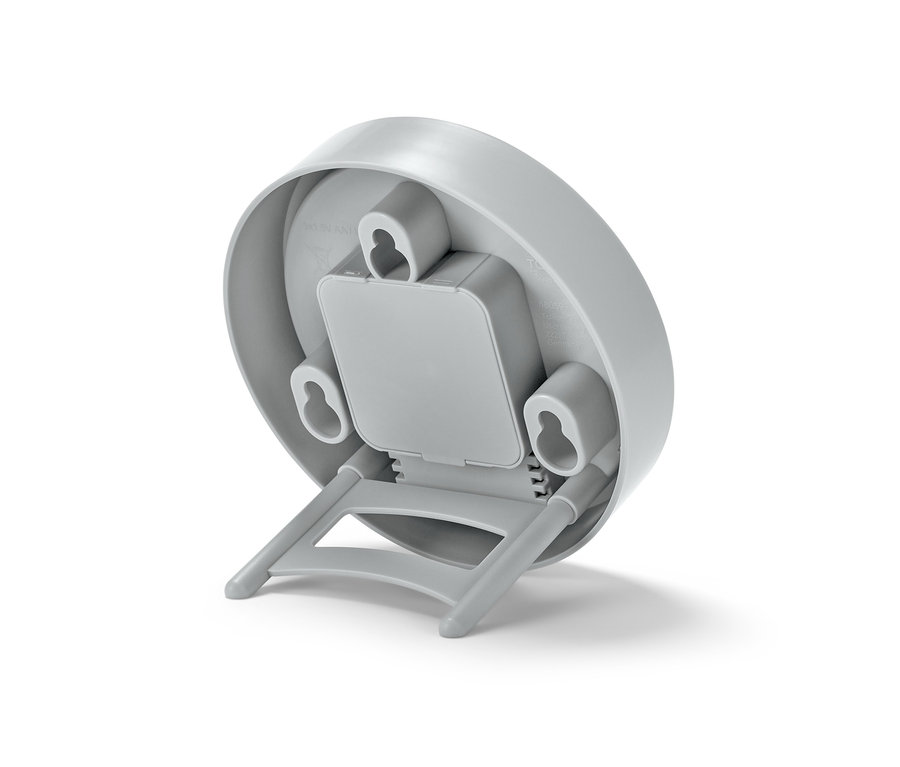 Detailansicht der Rückseite einer grauen Badwanduhr.