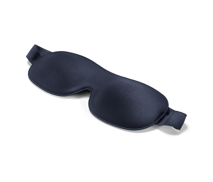 Eine dunkelblaue Schlafmaske.