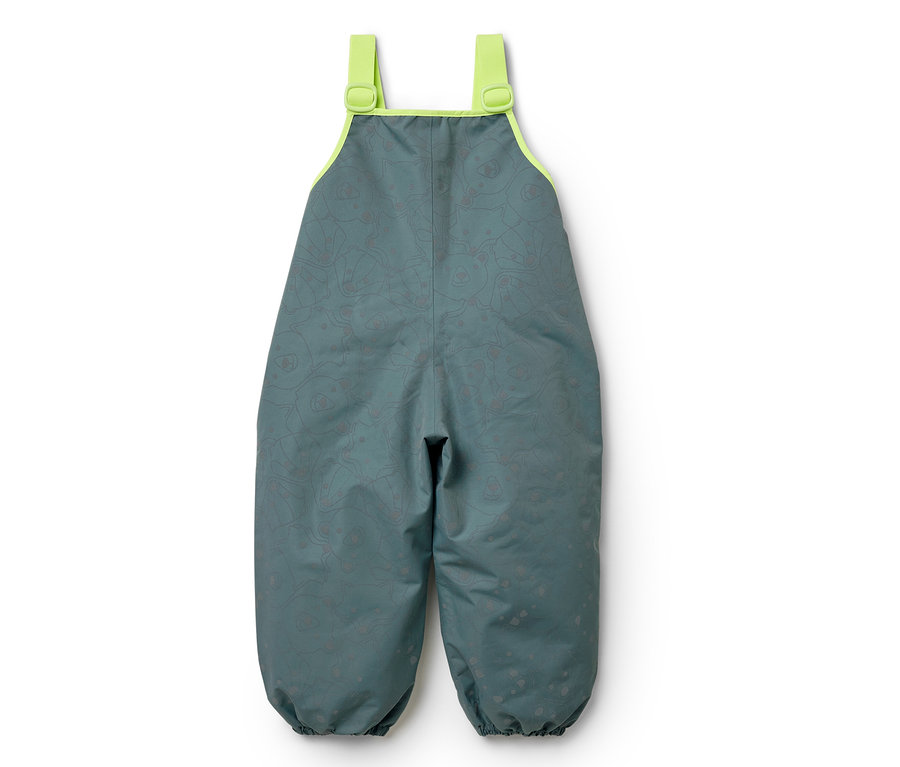 Grüne Kinder-Latzhose mit Muster auf weißem Hintergrund.