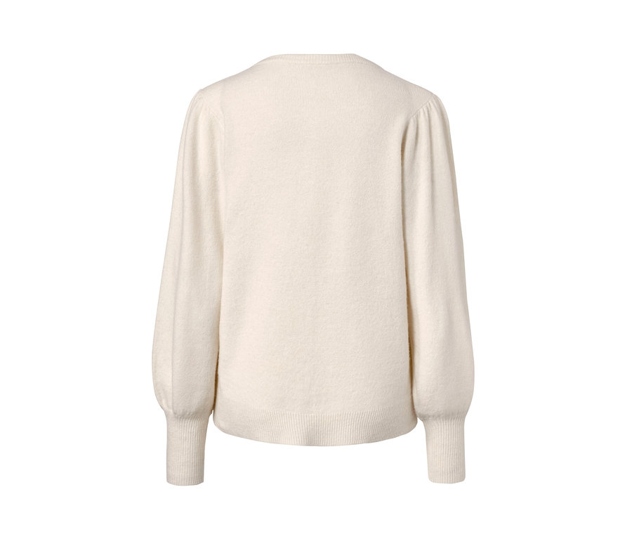 Cremefarbene Feinstrickjacke mit Puffärmeln.