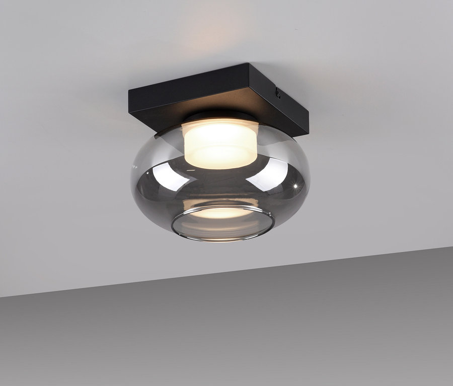 SCHÖNER WOHNEN-Kollektion Deckenleuchte »SIA« mit einem runden, grauen Glasschirm und einem schwarzen, quadratischen Sockel an einer Decke.