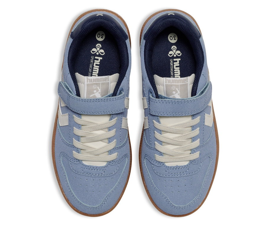 Draufsicht auf blaue hummel® Sneaker Handball Perfekt CL JR mit Klettverschluss und weißen Schnürsenkeln.
