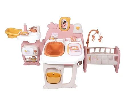 Rosa-weißes Spielzeug-Babypflegecenter mit Badewanne, Waschbecken und Wiege.