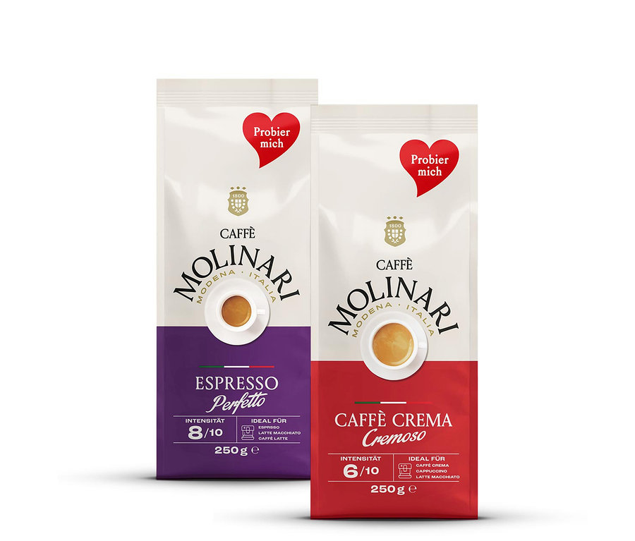 Zwei Packungen Caffè Molinari, eine Espresso Perfetto und eine Caffè Crema Cremoso.