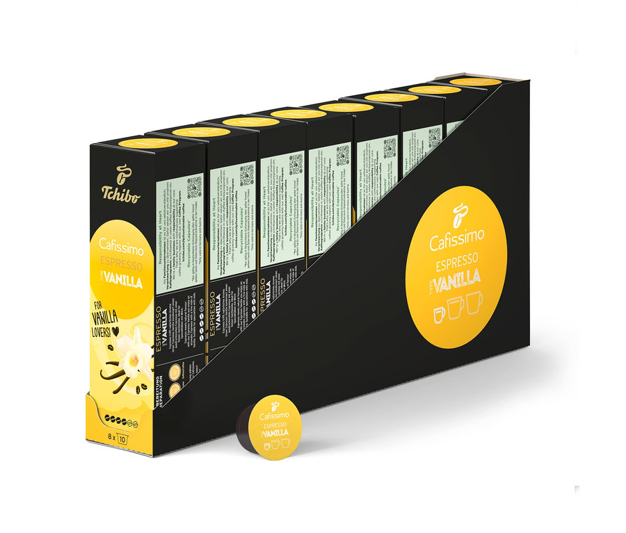 Mehrere Packungen Cafissimo Flavoured Espresso - Vanilla - 80 Kapseln in einer schwarzen Halterung.