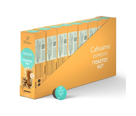 Eine Reihe Cafissimo Flavoured Espresso - Tostaed Nut Kapselpackungen in einer gelben Halterung, plus eine einzelne Kapsel.