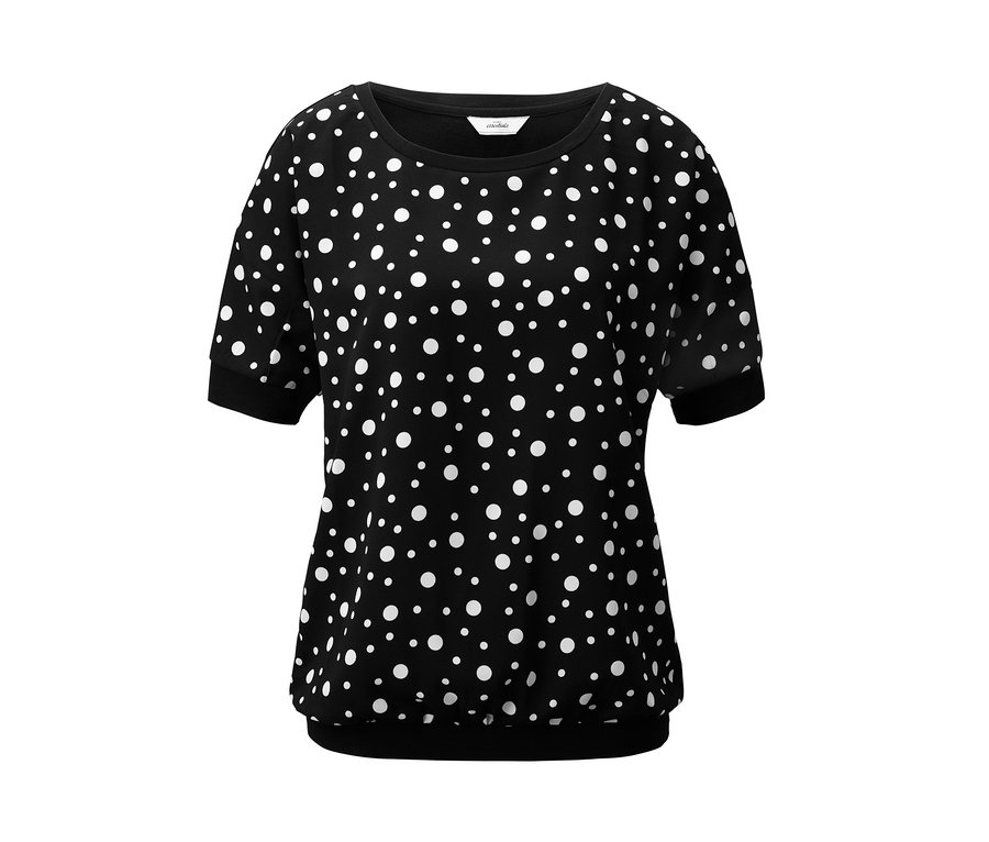 Ein schwarzes Halbarm-Shirt mit Fledermausärmeln und weißen Punkten.