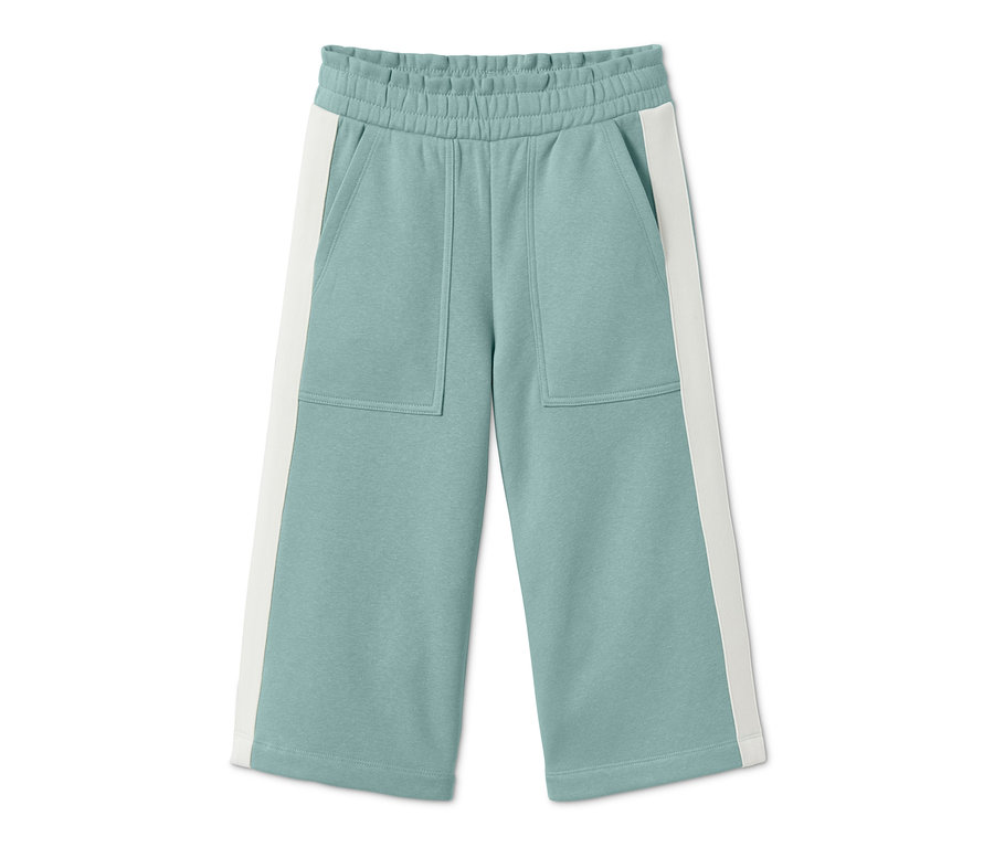 Eine grüne Sweat-Culotte mit weißen Streifen an den Seiten.