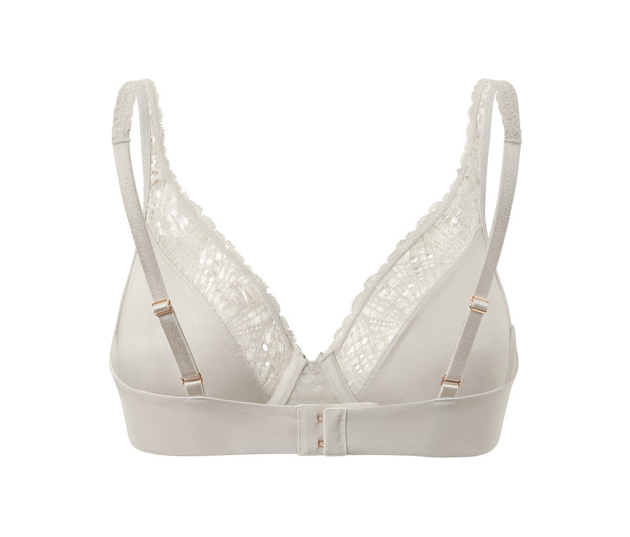 Detailansicht eines mandelfarbenen Bügel-BHs mit Spitze.