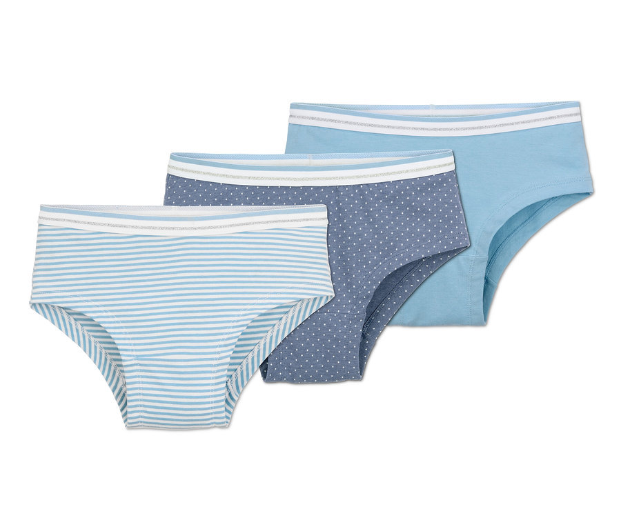Drei Mädchen-Pantys: eine blau mit weißen Streifen, eine dunkelblau mit weißen Punkten und eine hellblau.