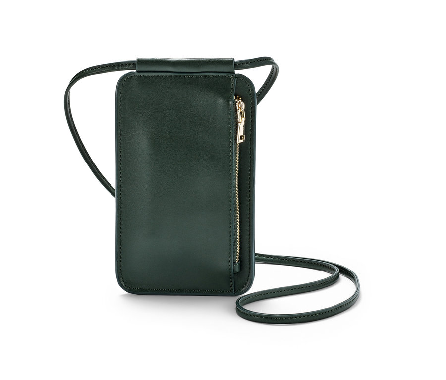 Eine grüne Mini-Tasche mit Riemen und goldenem Reißverschluss.