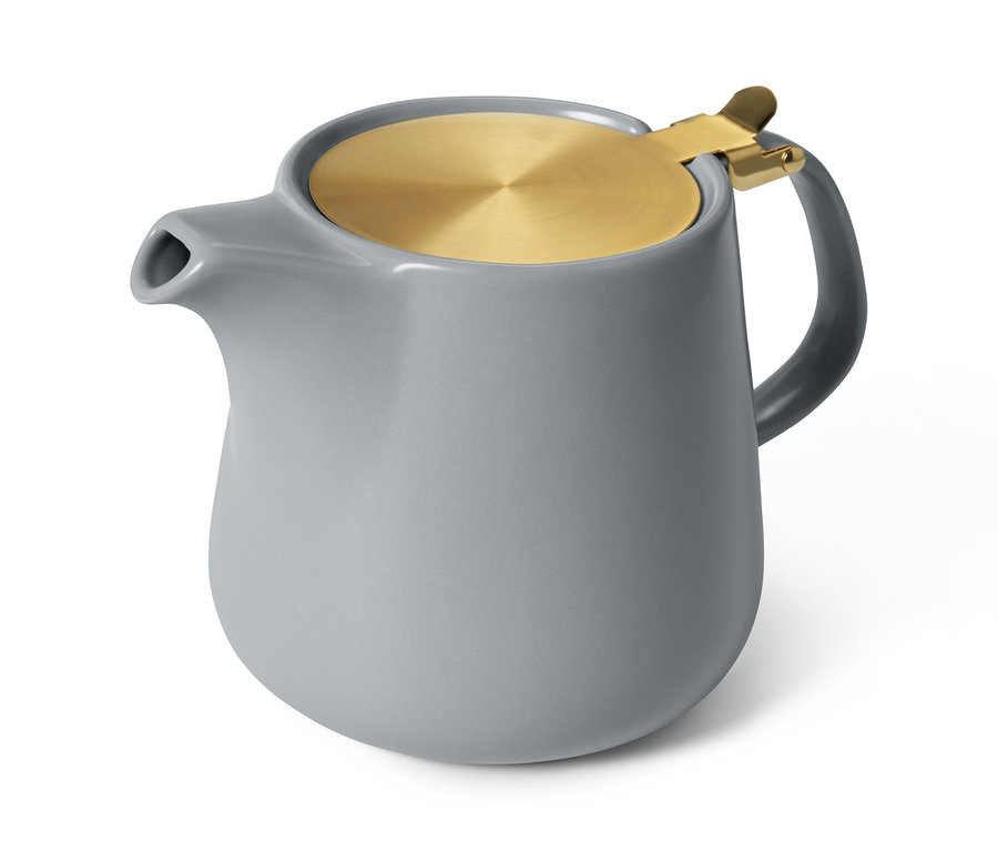 Graue Teekanne mit Messingdeckel.