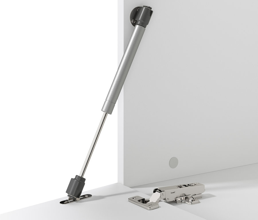 Ein Schließmechanismus und ein Scharnier auf einer weißen Oberfläche.