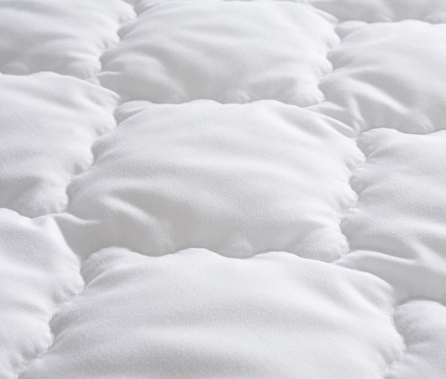 Detailansicht einer weißen Badenia Matratzentopper Senso.