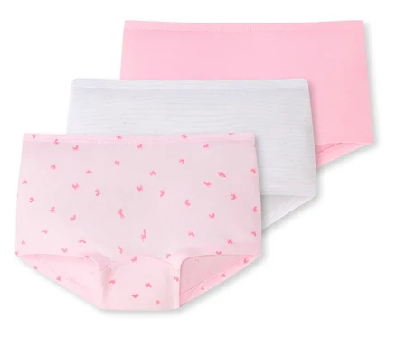 Drei SCHIESSER Kinder-Pantys übereinander gestapelt: einfarbig rosa, weiß mit rosa Streifen und rosa mit kleinen Einhorn-Mustern.