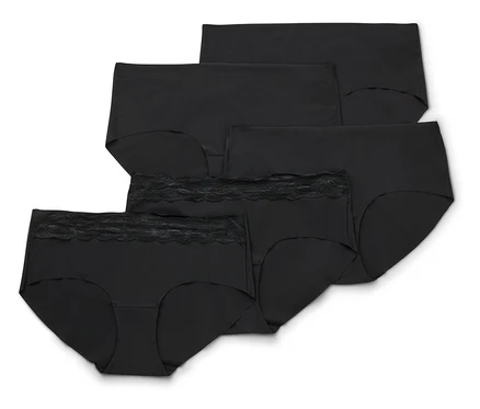 Fünf schwarze Magic-Cut-Pantys, die vorderste mit schwarzer Spitzenborte am Bund.