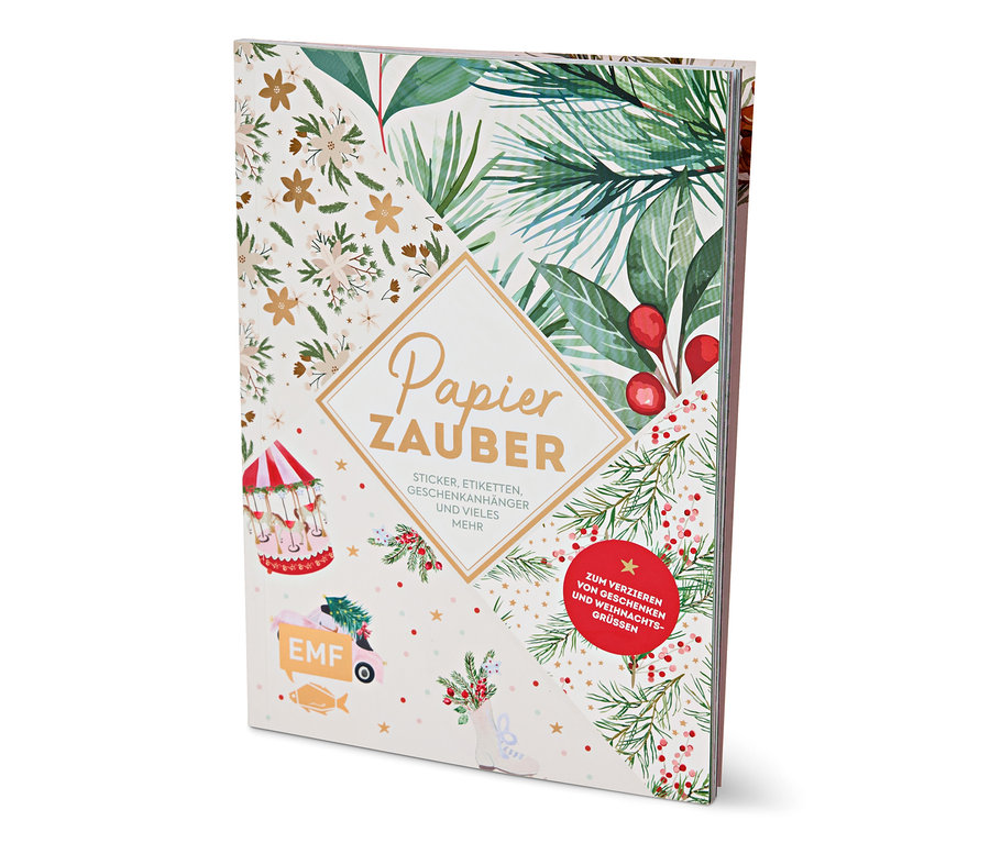 Buch mit Weihnachtsmotiv und dem Schriftzug Papier Zauber.