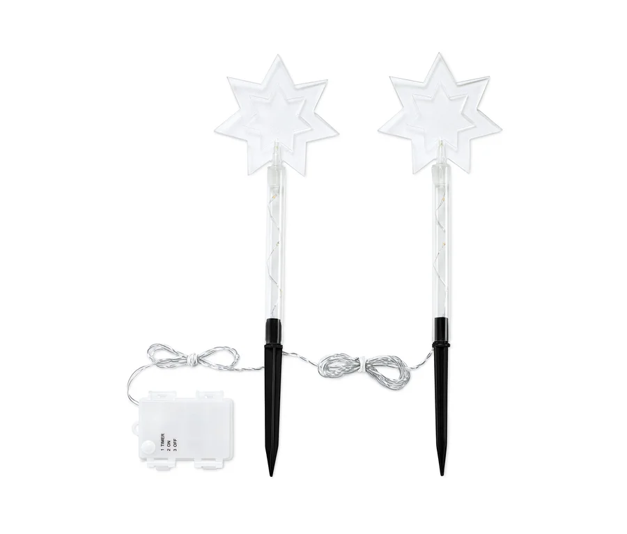 Zwei LED-Gartenstecker in Sternform.