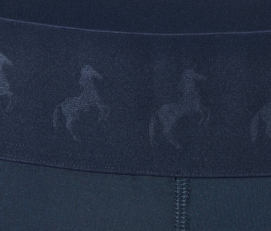Detailansicht einer Grip-Vollbesatz-Reittight aus recyceltem Polyester, mit Pferde-Muster am Bund.