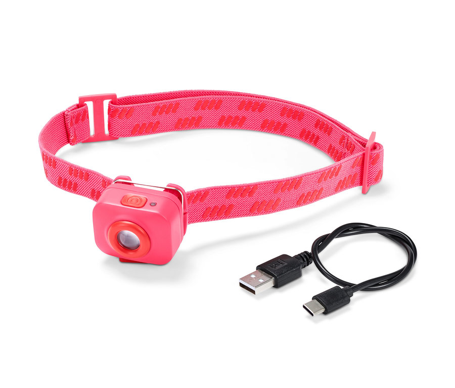 Eine pinke, kompakte Stirnlampe mit Ladekabel.