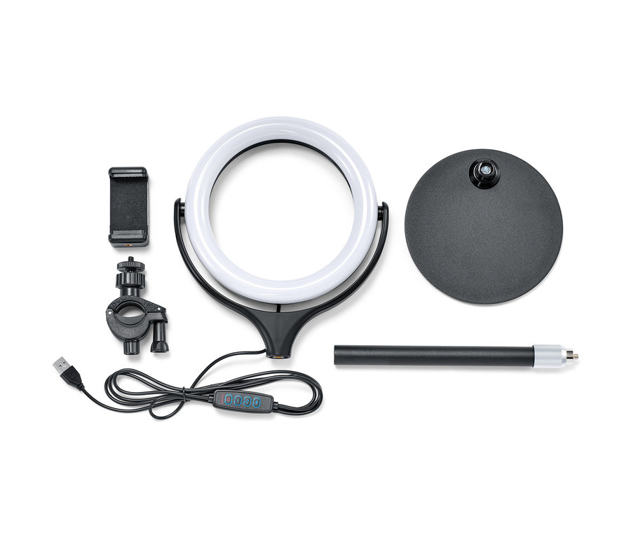 Ein 8-Zoll-LED-Selfie-Ringlicht mit Standfuß, Telefonhalterung, Bedienfeld und USB-Kabel liegt ausgebreitet.