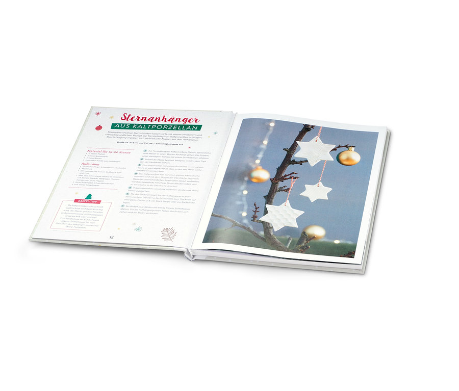 Aufgeschlagenes Buch »Weihnachtsbasteln«, abgebildet sind Sterne und goldene Kugeln.