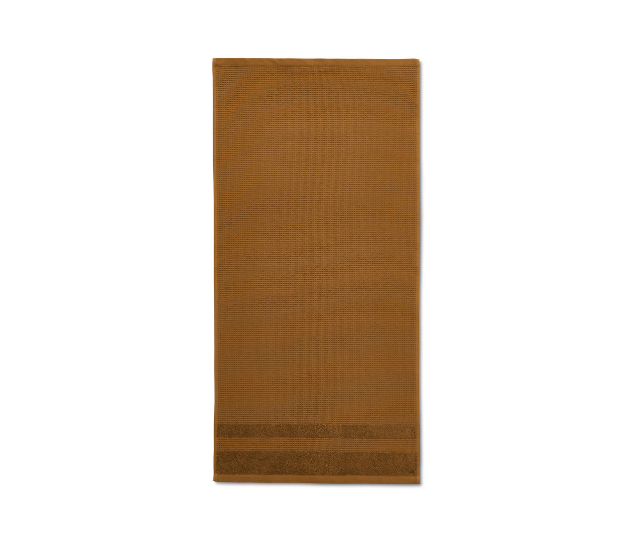 Ein ockerfarbenes Premium-Waffelpiqué-Handtuch.