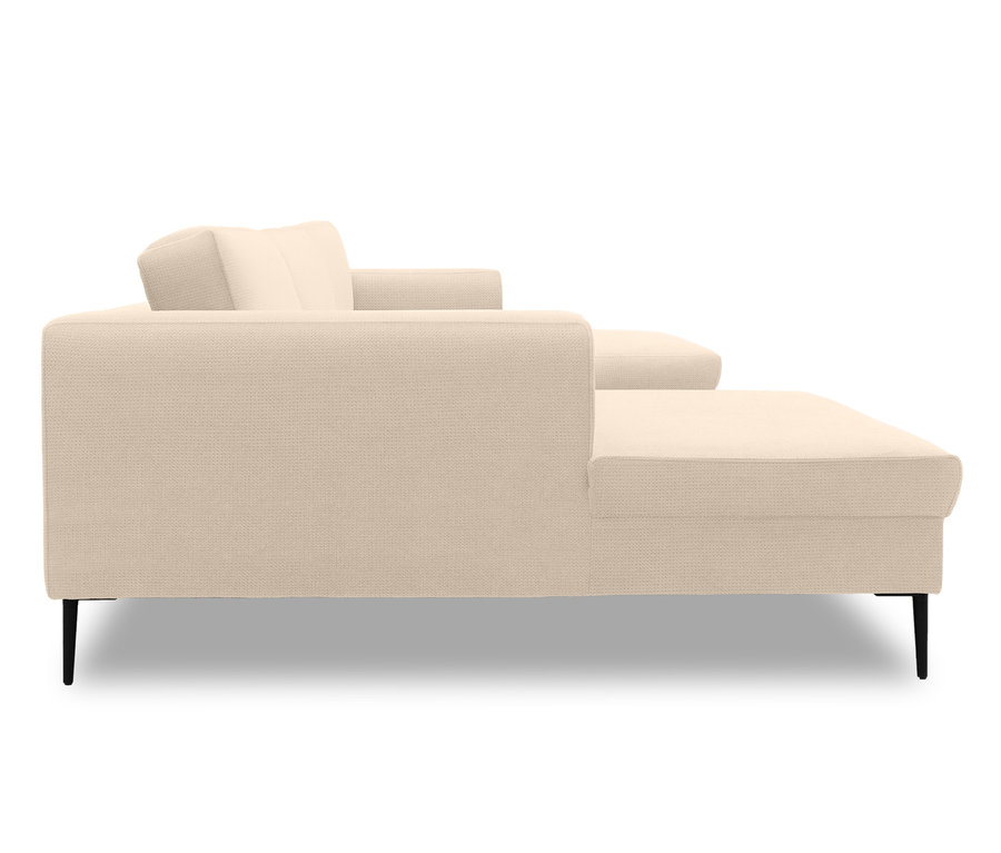 Seitenansicht des cremefarbenen U-Form Sofas »Modica«.