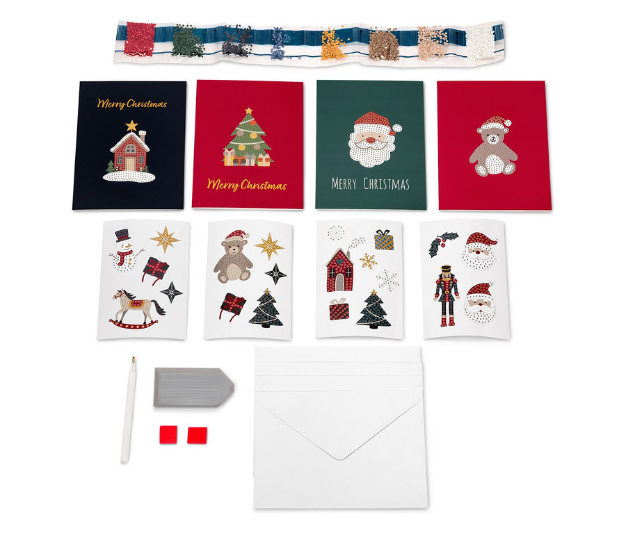 Set aus Weihnachtskarten mit Umschlägen, Stift und Radiergummi.