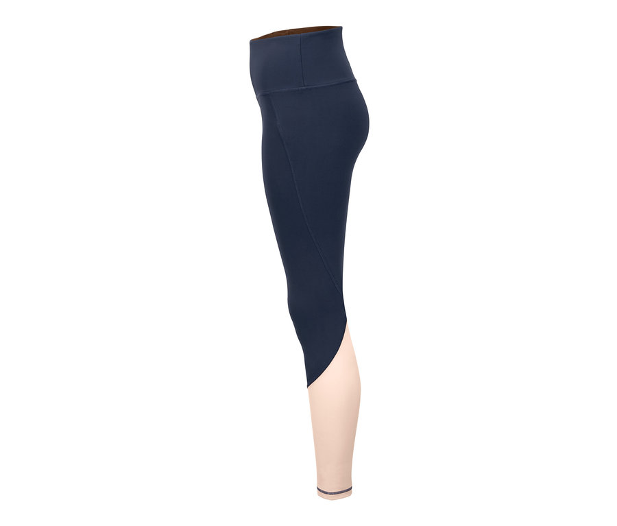 Detailaufnahme einer Damen Colorblocking-Sporttight, die oben dunkelblau und von den Knien abwärts hellrosa ist.
