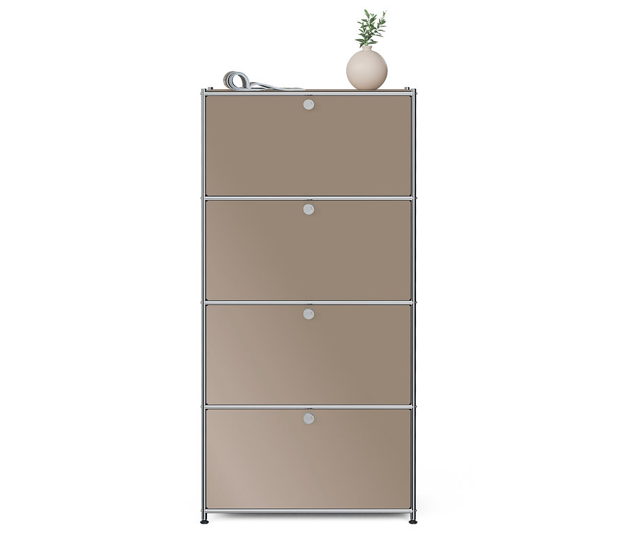 Ein vierstöckiger Schrank mit einer Blume und einer Zeitung oben drauf.