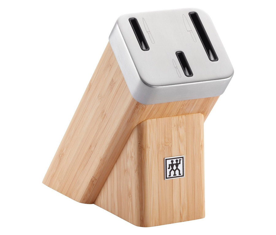 Ein Messerblock aus Holz mit silberner Oberseite und ZWILLING-Logo.