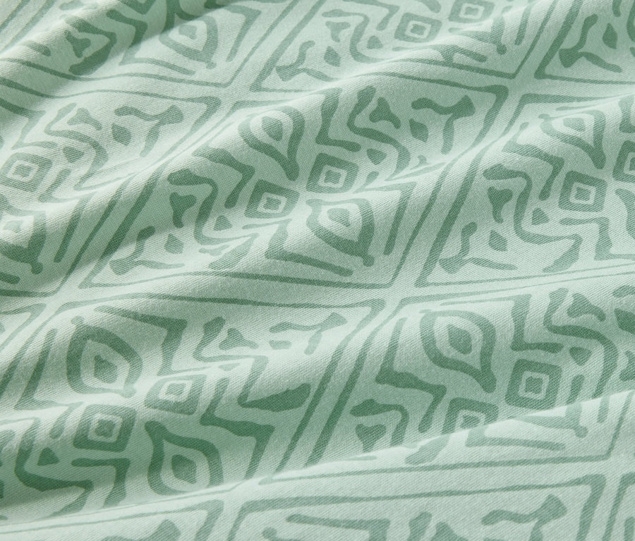 Detailaufnahme der grünen Jersey-Bettwäsche in Normalgröße.