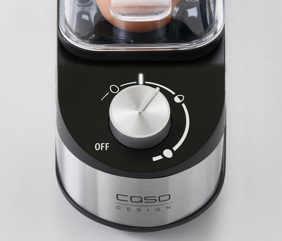 Detailansicht eines Eierkochers mit einem Drehknopf auf der Vorderseite.