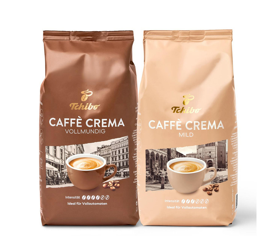 Zwei Packungen Caffè Crema Bestseller-Set - Ganze Bohne von Tchibo. Eine Packung ist braun, die andere beige.