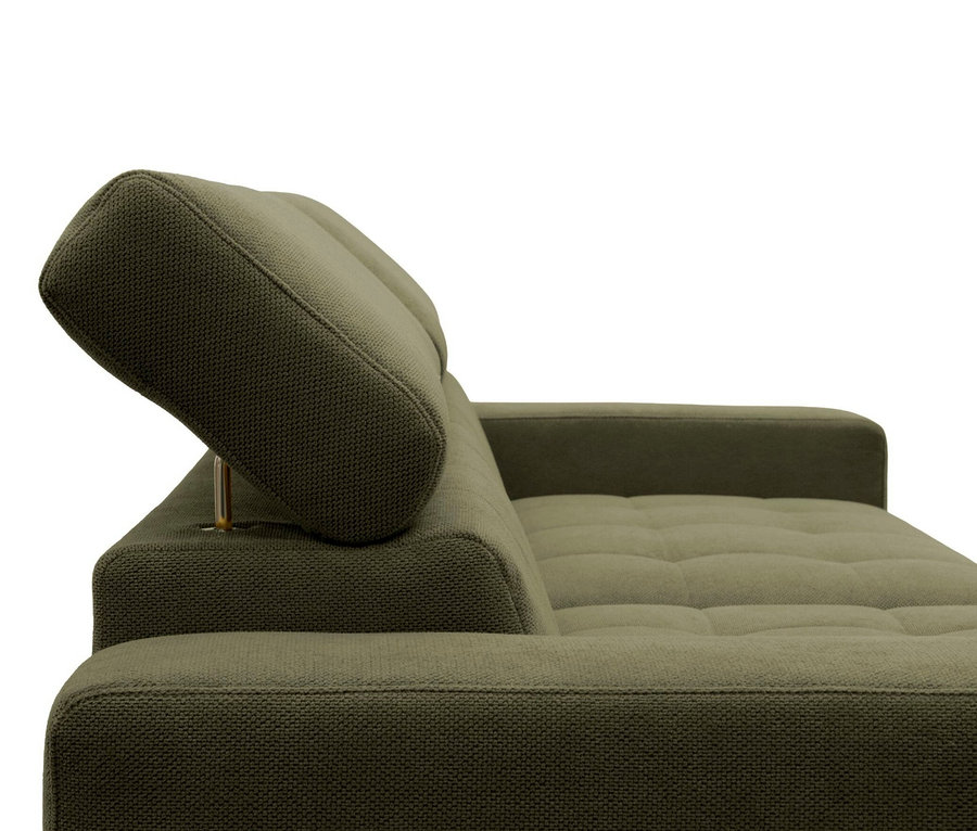 Nahaufnahme eines dunkelgrünen Sofas mit strukturierter Oberfläche und verstellbarer Kopfstütze.