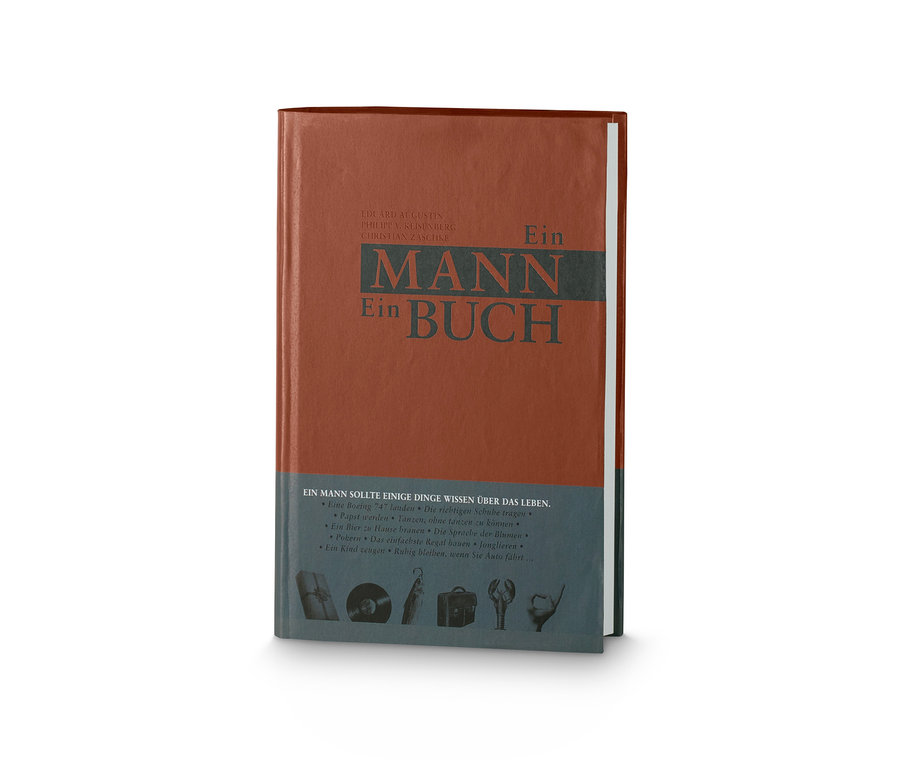 Das Buch »Ein Mann, ein Buch« liegt auf einer weißen Oberfläche.