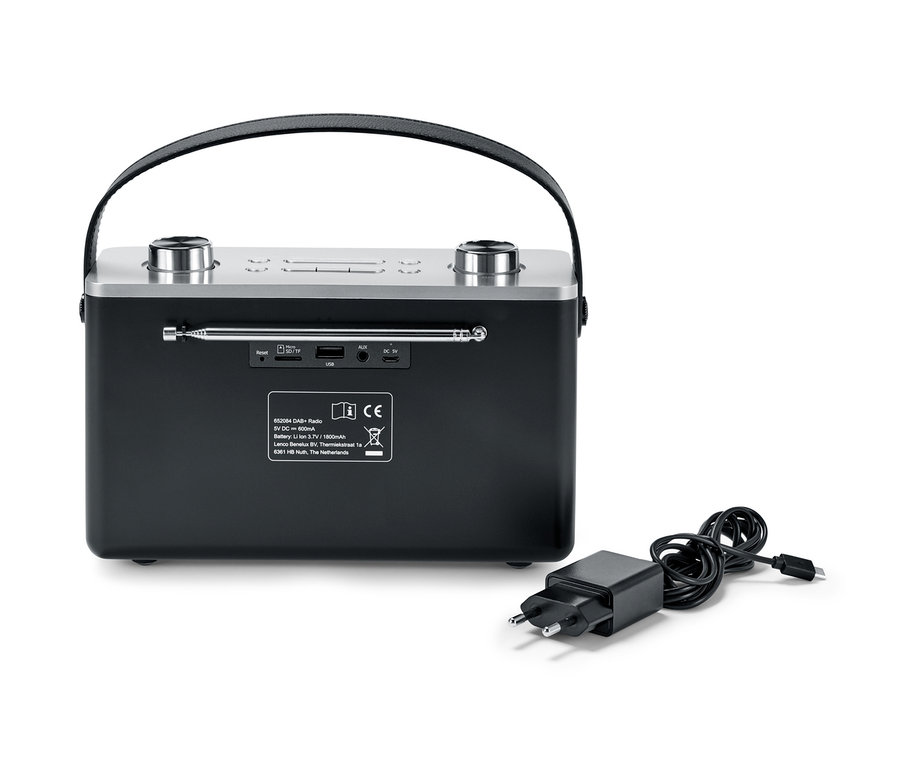 Schwarzes DAB+/FM-Digitalradio mit Bluetooth® und Netzteil liegen daneben.