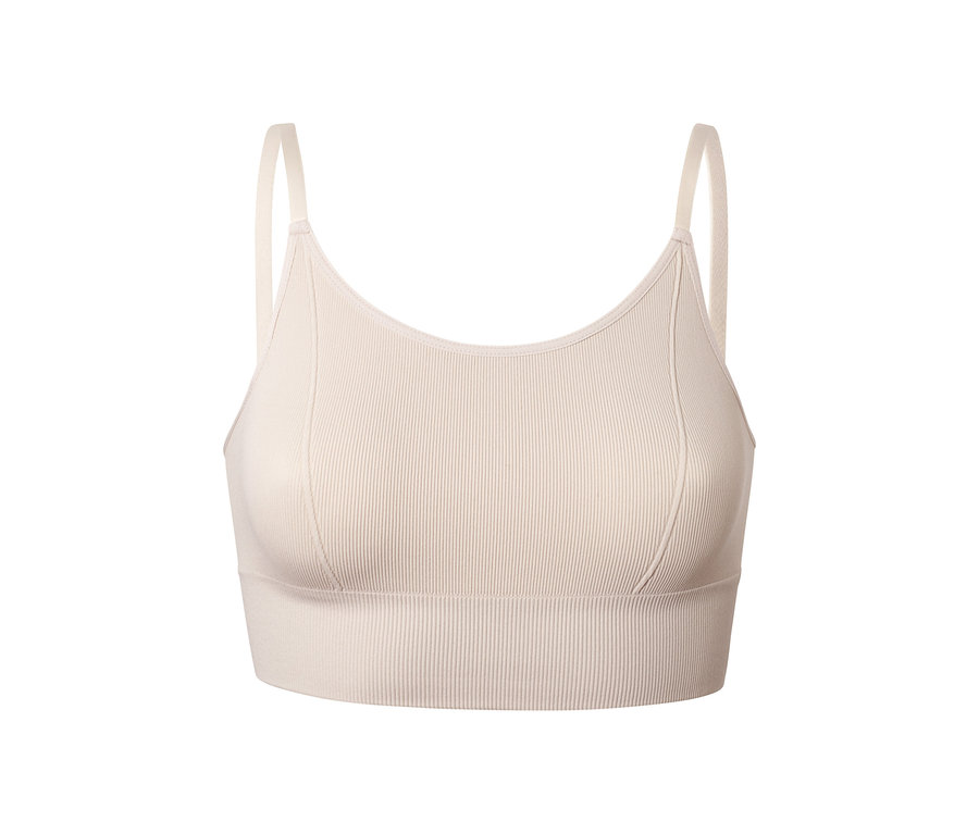 Beige Longline-Seamless-Bustier mit dünnen Trägern.