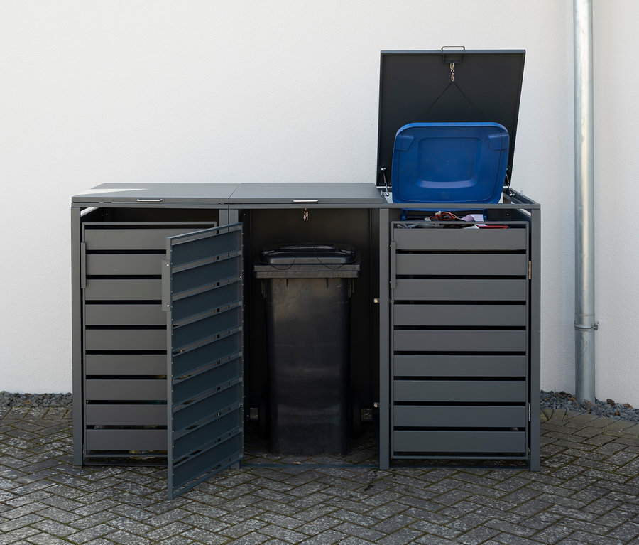 Geöffnete Mülltonnenbox aus Stahl für 3 Tonnen.