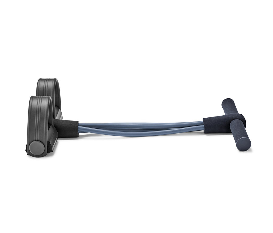 Grauer Bauch-und-Rückentrainer mit Fuß- und Handgriffen auf weißem Hintergrund.