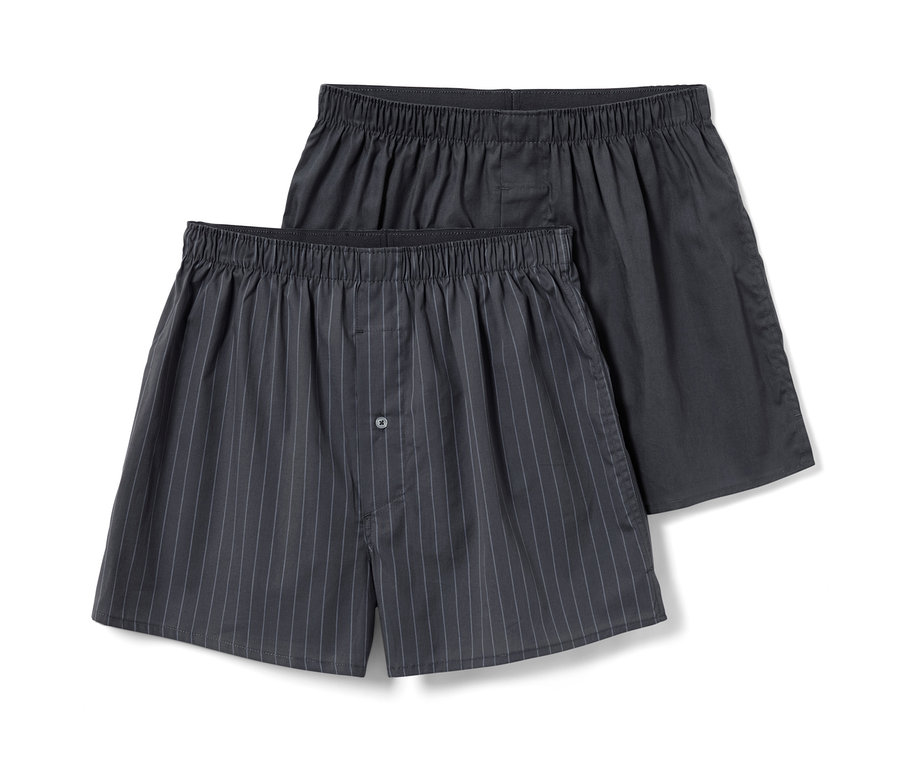 Zwei anthrazitfarbene Web-Boxershorts.