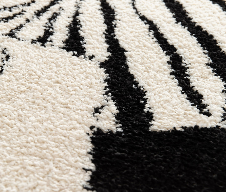 Detailaufnahme des Kinderteppichs NOMAD Zebra, ca. 120 x 170 cm.