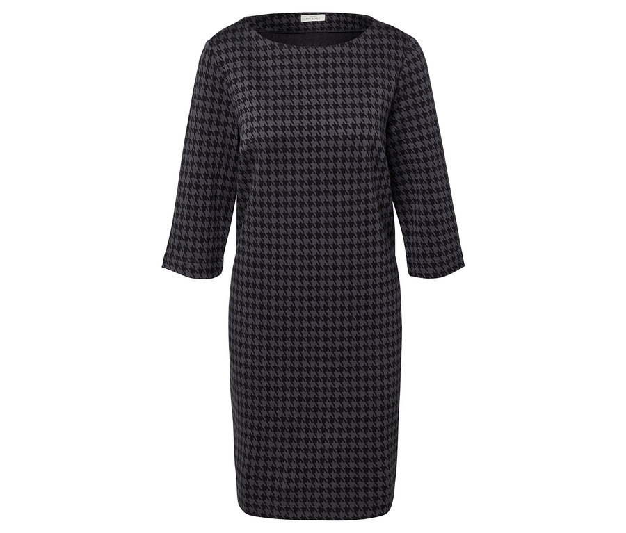 Ein Kleid mit Dreiviertelärmeln im Hahnentrittmuster.