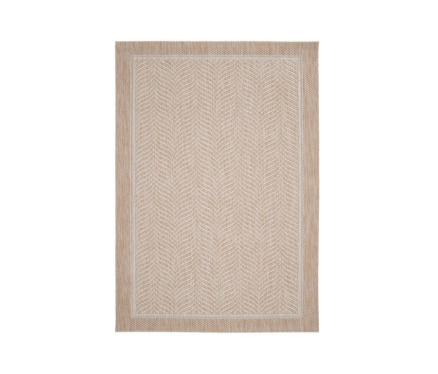 Detailansicht eines beigen Teppichs »Twine« mit Fischgrätenmuster.