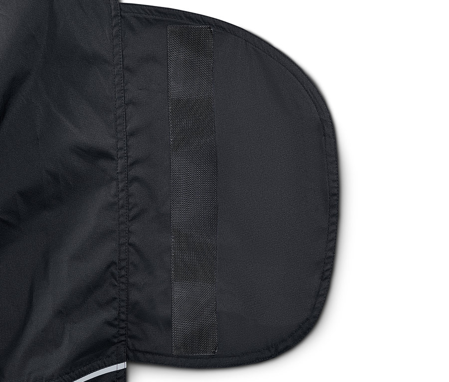 Detailaufnahme von Unisex-Regenchaps mit schwarzem Riemen.