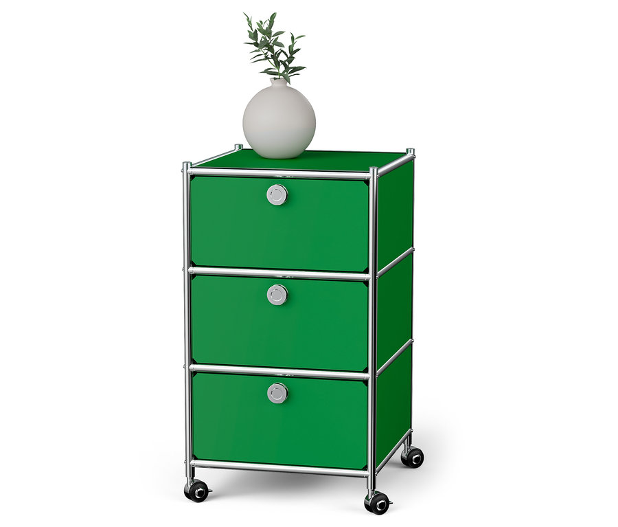 Grüner Rollcontainer Metall »CN3« mit 3 Schubladen. Oben drauf steht eine weiße Vase.