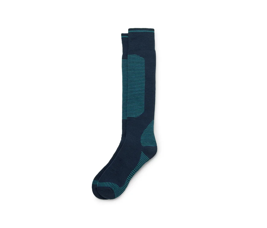 Ein Paar kniehohe Socken in Dunkelblau mit türkisen Streifen und Akzenten, auf weißem Hintergrund.