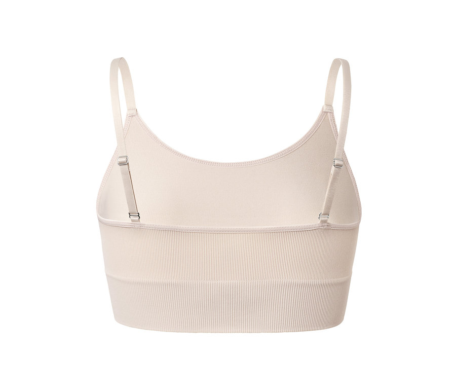 Detailansicht von hinten auf ein beiges Longline-Seamless-Bustier mit verstellbaren Trägern.
